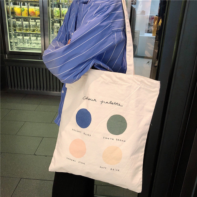Eco-Friendly Canvas Tote Bag with Multicolored Design