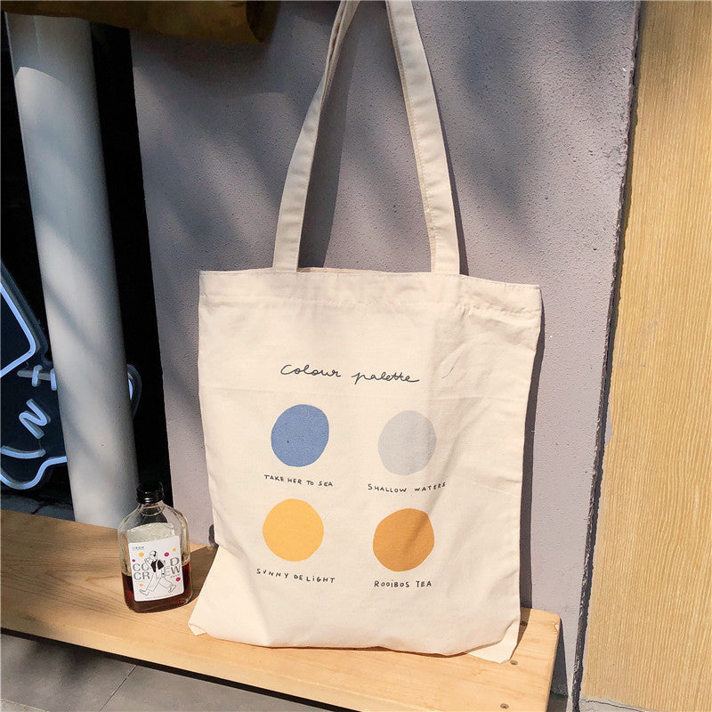 Eco-Friendly Canvas Tote Bag with Multicolored Design