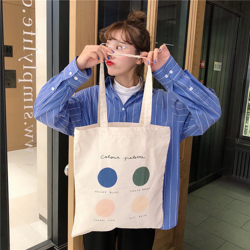 Eco-Friendly Canvas Tote Bag with Multicolored Design