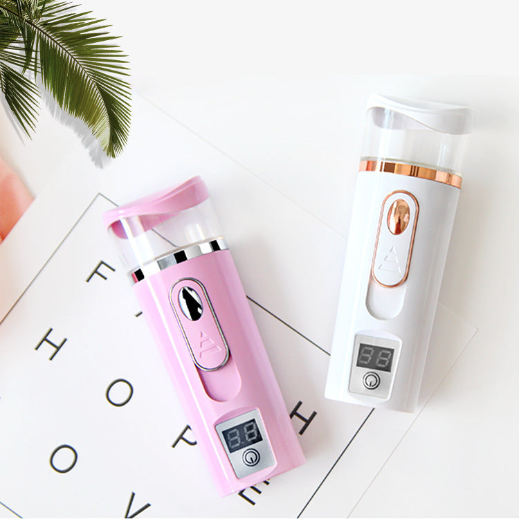 Pink Handheld Mist Sprayer with Digital Display for Skincare and Hydration