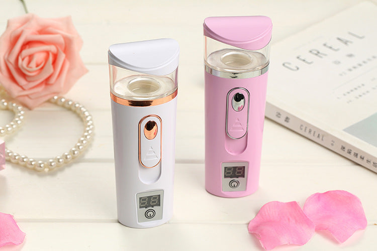 Pink Handheld Mist Sprayer with Digital Display for Skincare and Hydration