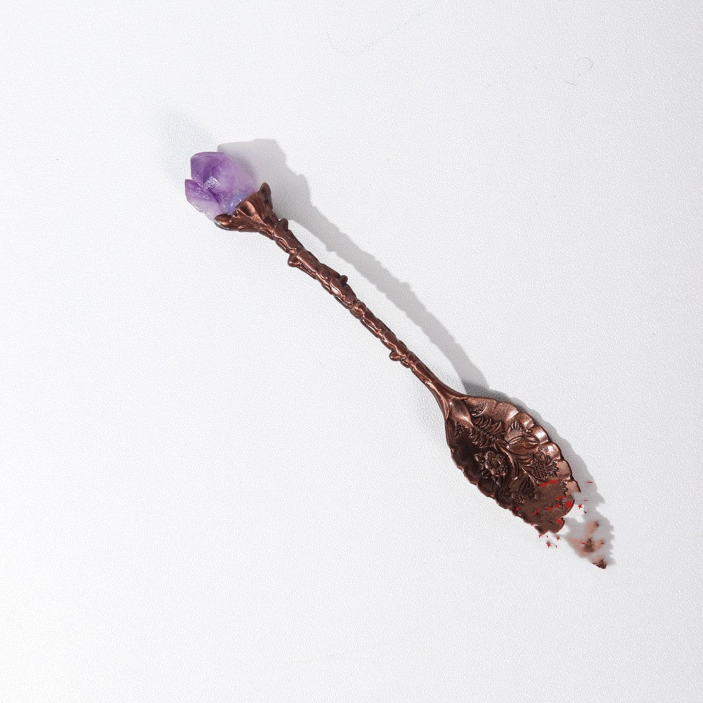 Ornate Bronze and Copper Decorative Spoons with Purple Stone Accents