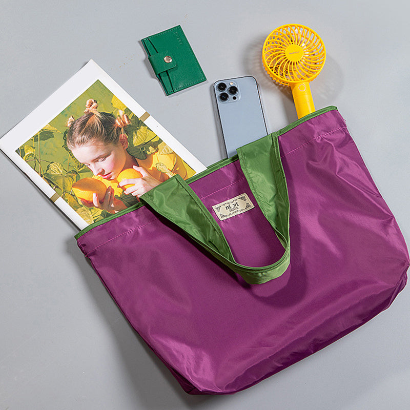 Turquoise Reusable Tote Bag with Orange Handles - Eco-Friendly Shopping Solution