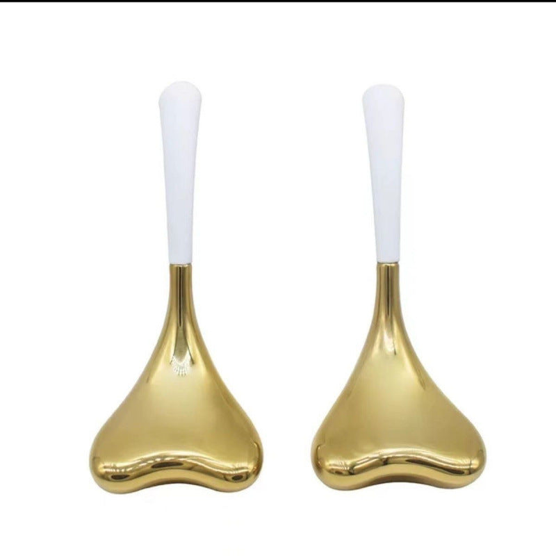 Silver Teardrop Facial Massage Tool for Relaxation and Wellness