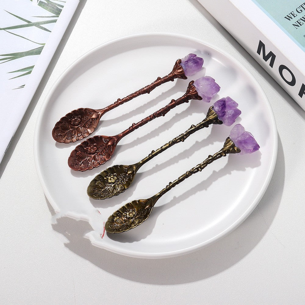 Ornate Bronze and Copper Decorative Spoons with Purple Stone Accents