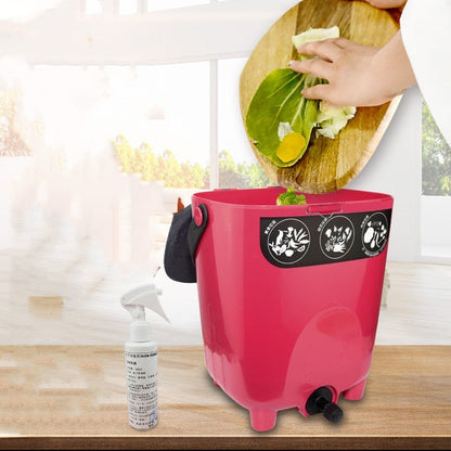 Pink kitchen compost bin with odor control spray bottle