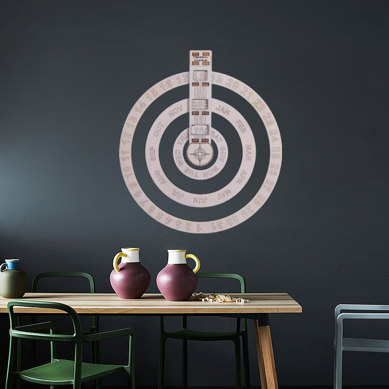 Light pink circular perpetual wall calendar with concentric rings