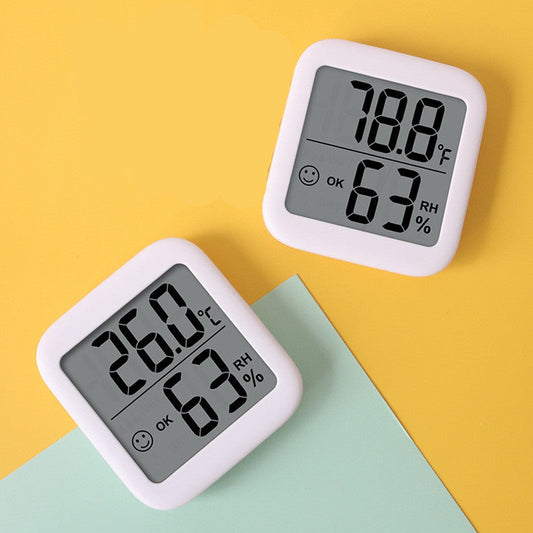 Compact Digital Thermo-Hygrometer with White Casing and Black Display