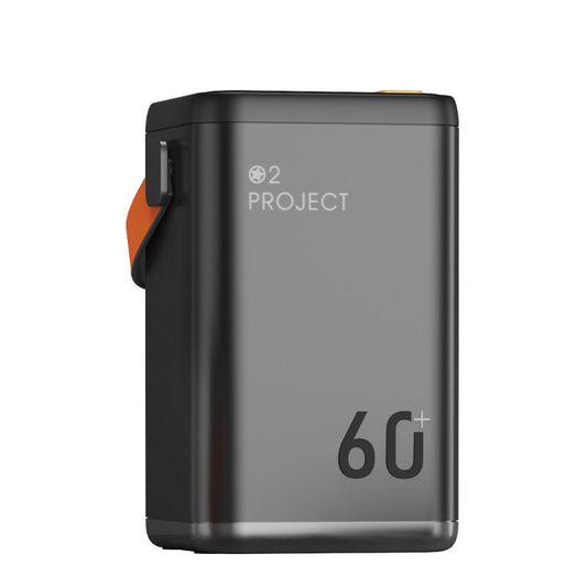 Portable air purifier with black and orange accents for eco-friendly air quality