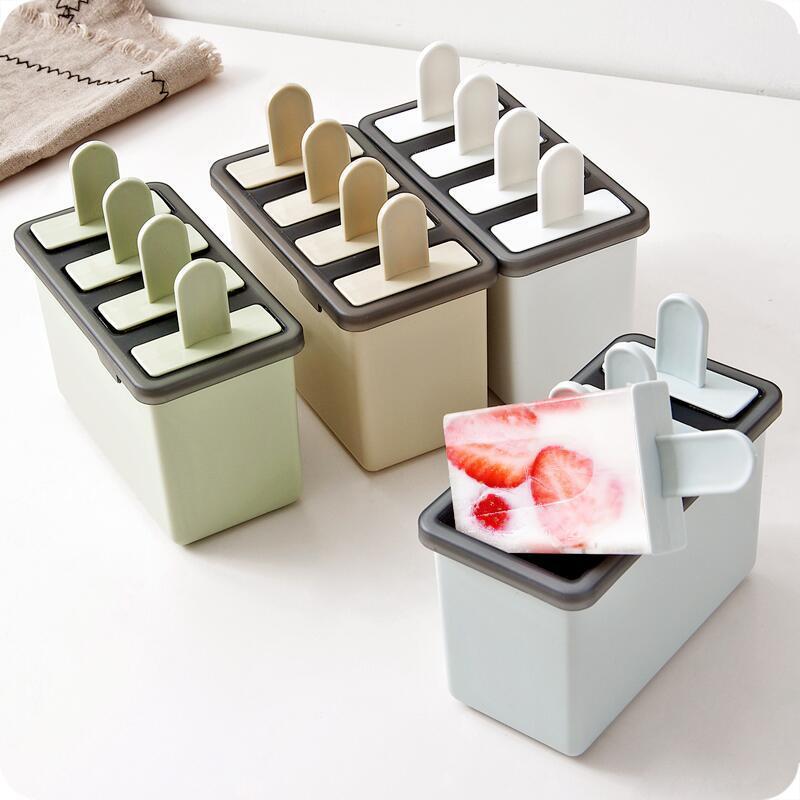 Eco-Friendly Reusable Ice Pop Molds in Green, Beige, and Light Blue