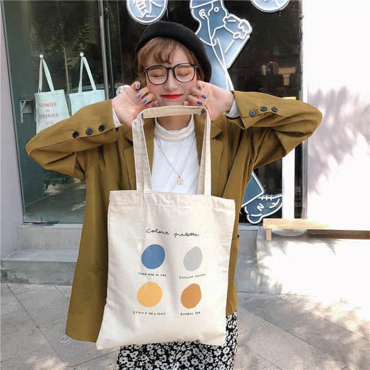 Eco-Friendly Canvas Tote Bag with Multicolored Design