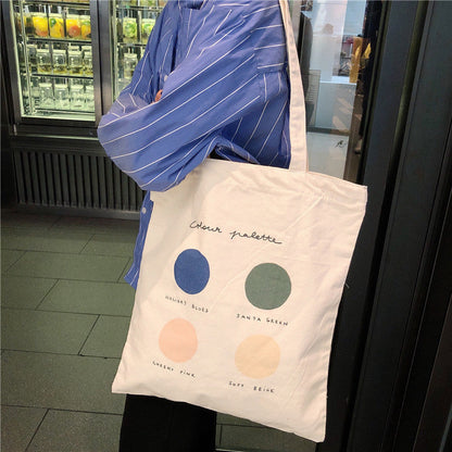 Eco-Friendly Canvas Tote Bag with Multicolored Design