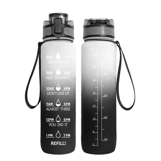 Gradient black and clear water bottle with time markers and carrying strap