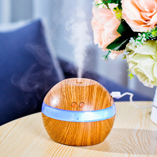 Spherical wood grain essential oil diffuser with blue LED light