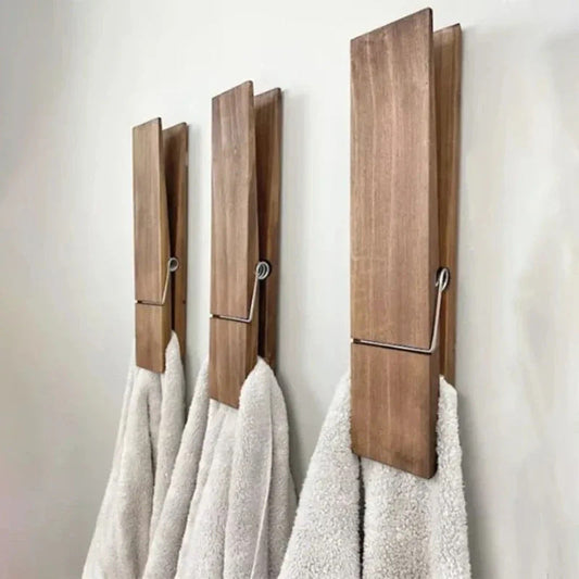 Natural wood towel hooks with a clothespin design for sustainable home organization