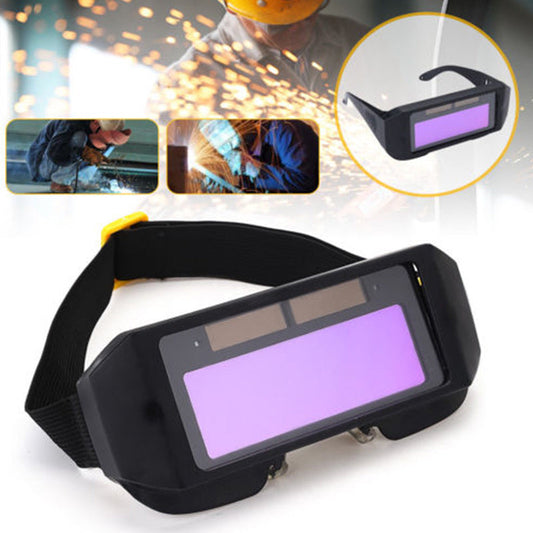 Black welding goggles with purple lens for safety and comfort