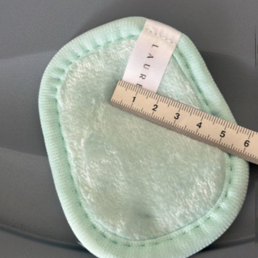 Light green oval reusable makeup remover pad