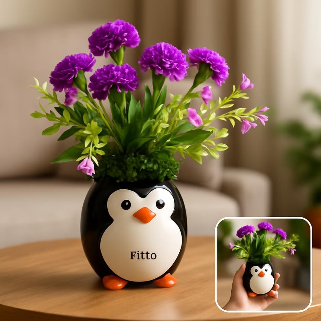 Penguin Flower Pot with Vibrant Artificial Flowers and Green Foliage