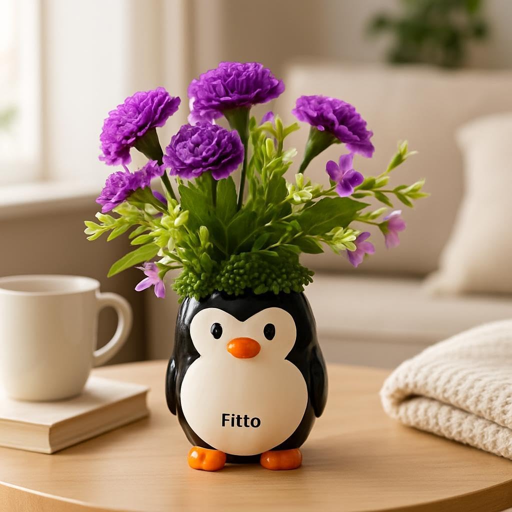 Penguin Flower Pot with Vibrant Artificial Flowers and Green Foliage