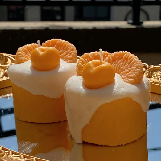 Eco-friendly decorative candle with orange and white fruit design
