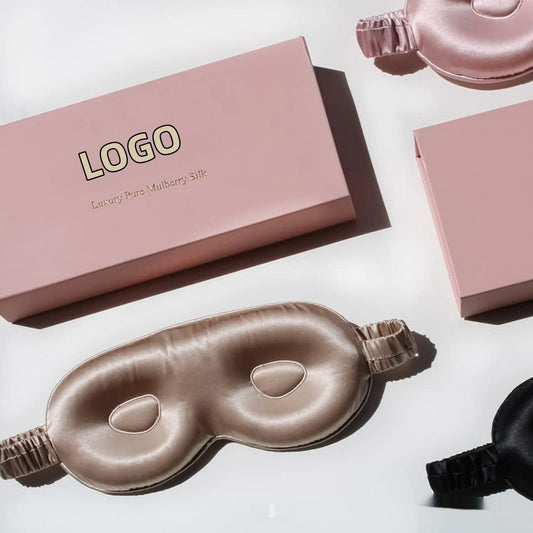 Light pink and black Mulberry Silk Sleep Mask in luxury packaging