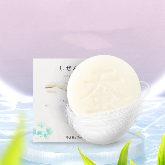 Natural round soap bar in eco-friendly packaging