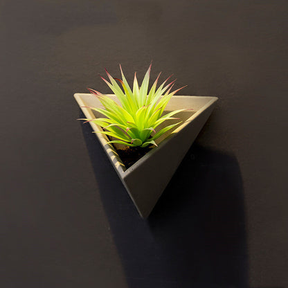 Eco-Friendly Triangular Wall-Mounted Planter for Indoor Greenery