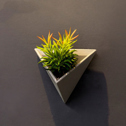 Eco-Friendly Triangular Wall-Mounted Planter for Indoor Greenery
