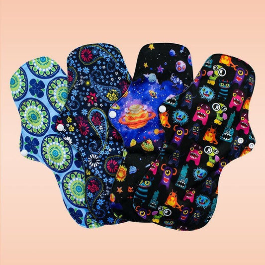 Multicolored reusable cloth menstrual pads with floral, space, and cartoon designs