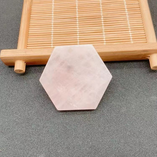 Light pink hexagonal soap bar made from natural ingredients