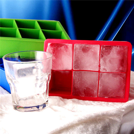 Red and green silicone ice cube tray with square compartments