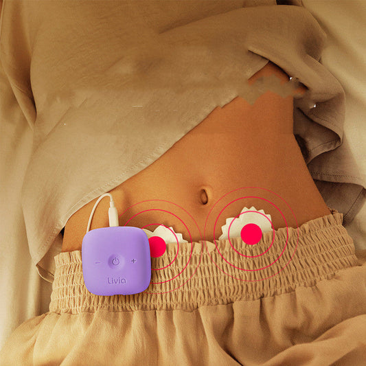 Purple portable menstrual pain relief device with rounded edges