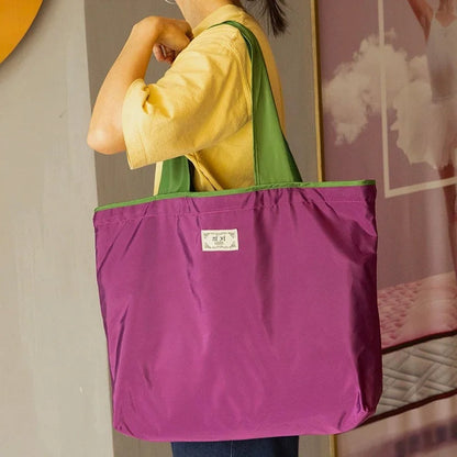 Turquoise Reusable Tote Bag with Orange Handles - Eco-Friendly Shopping Solution